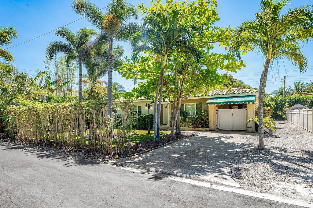 Photo of 310 Russlyn Drive, West Palm Beach, FL 33405 (MLS # B26011069)