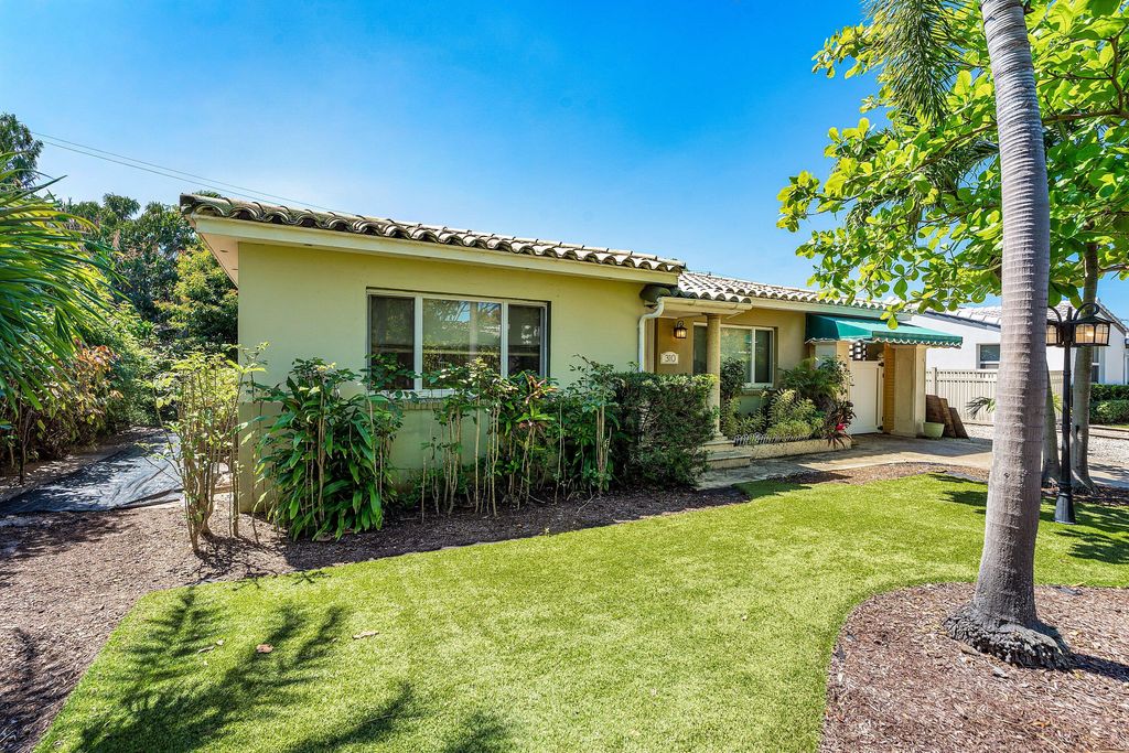 Photo of 310 Russlyn Drive, West Palm Beach, FL 33405 (MLS # B26011069)