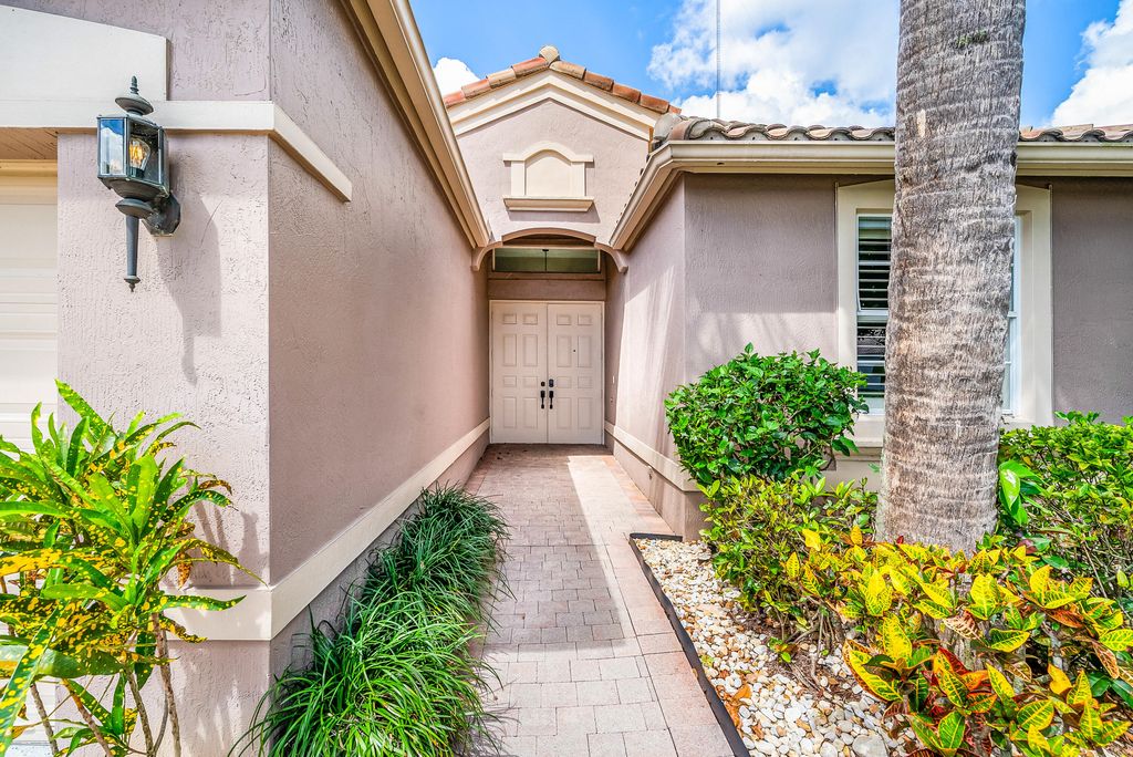 Photo of 9989 Torino Drive, Lake Worth, FL 33467 (MLS # B26013702)