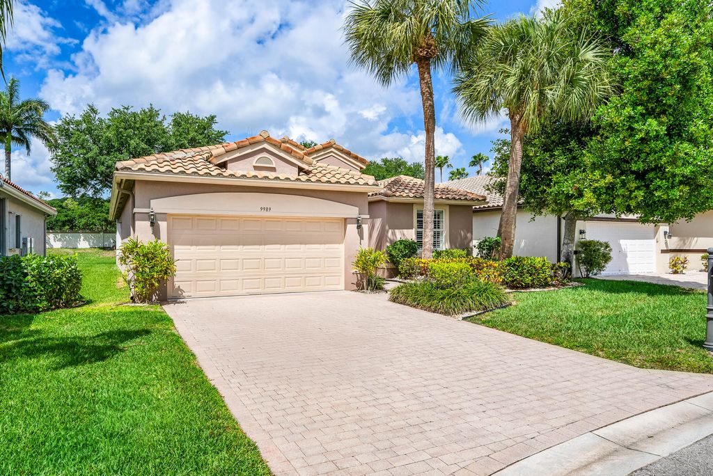 Photo of 9989 Torino Drive, Lake Worth, FL 33467 (MLS # B26013702)