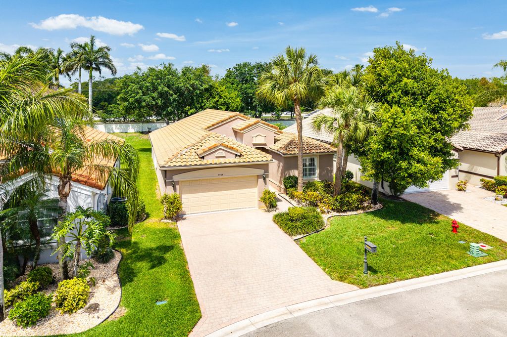 Photo of 9989 Torino Drive, Lake Worth, FL 33467 (MLS # B26013702)