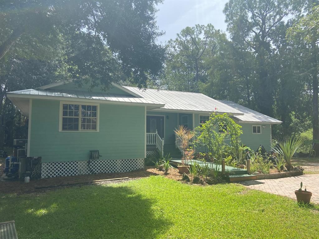 Photo of 8888 SE Sharon Street, Hobe Sound, FL 33455 (MLS # R10739257)