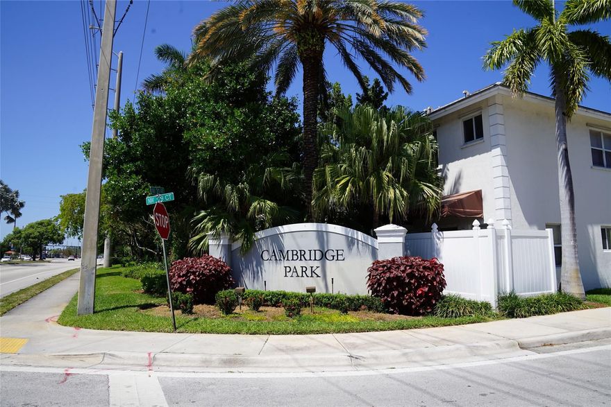 Beautifully maintained 3/2.5 corner townhouse with bonus room and 1-car garage in the desirable Cambridge Park community. Features include a welcoming foyer, spacious living room, open eat-in kitchen with wood cabinets and stainless steel appliances, tile flooring downstairs, and wood flooring upstairs. The large master suite offers a sitting area, walk-in closet, and walk-in shower, while bedrooms 2 & 3 share a Jack & Jill bathroom with double vanity. New A/C installed 06/27/24 new stove, new washer and dryer, and new blinds throughout, and a gated backyard patio perfect for relaxing. Conveniently located just 5–10 minutes from I-95, about 12 mins to Ft. Lauderdale Beach, and close to restaurants, gas stations, and shopping. Community amenities include a pool, playground, and low HOA fees