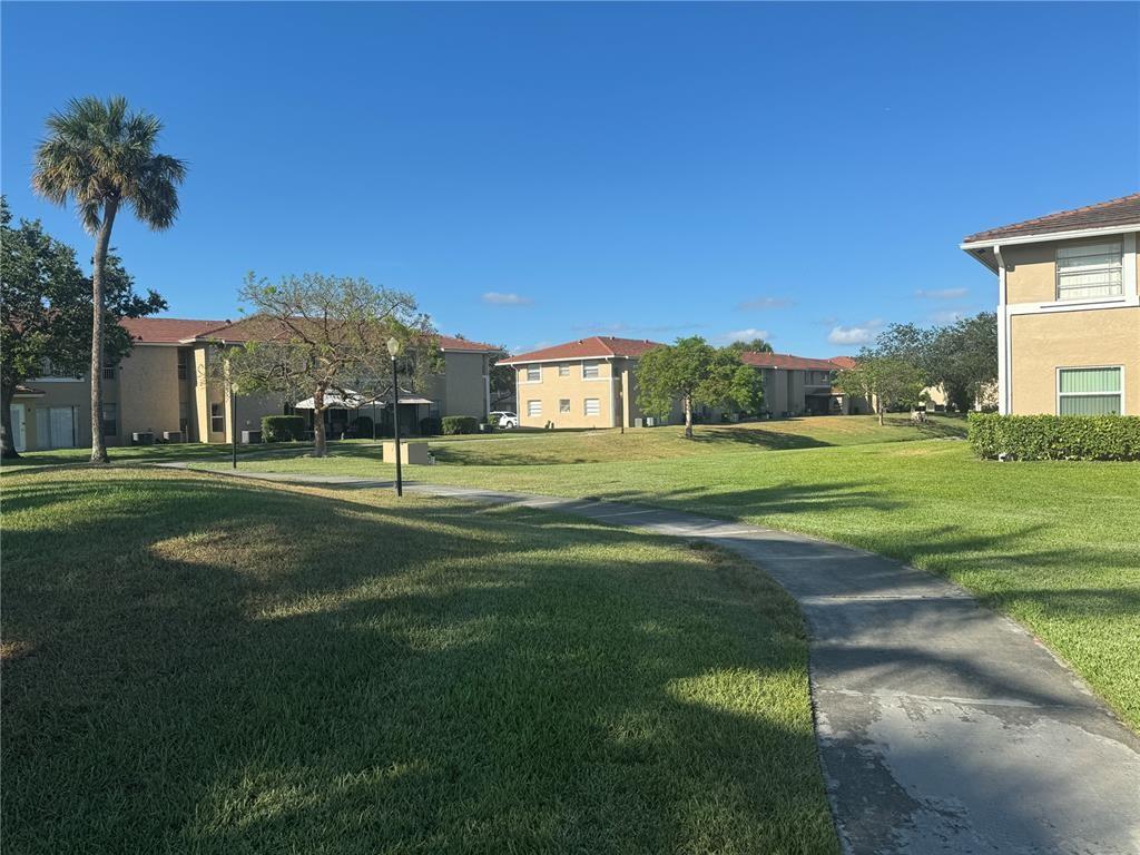 Great price improvement .Nice location first floor with lake view and private entrance . 2/2 all tiled newer kitchen freshly painted washer and dryer. Community pool . Walk to Coral Square Mall. Sam's club. close to Taravella H.S . Maple wood Elementary. tenant occupied lease ends on 10/31/25