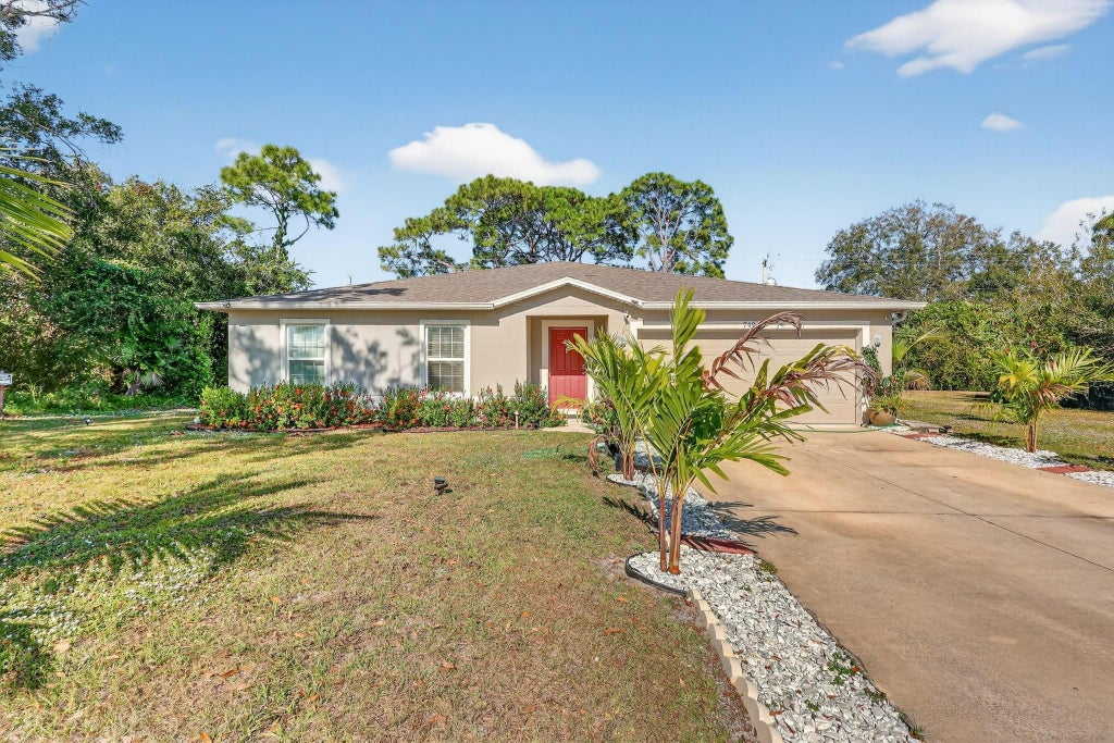 Photo of 7490 Penny Lane, Fort Pierce, FL 34951 (MLS # F10539588)