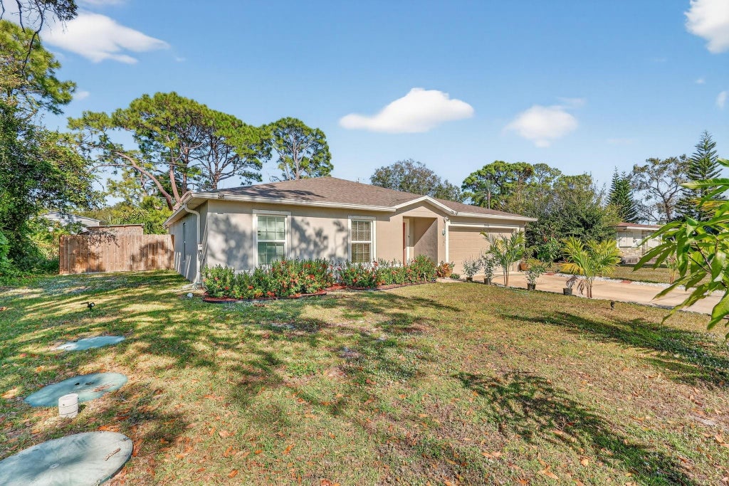 Photo of 7490 Penny Lane, Fort Pierce, FL 34951 (MLS # F10539588)