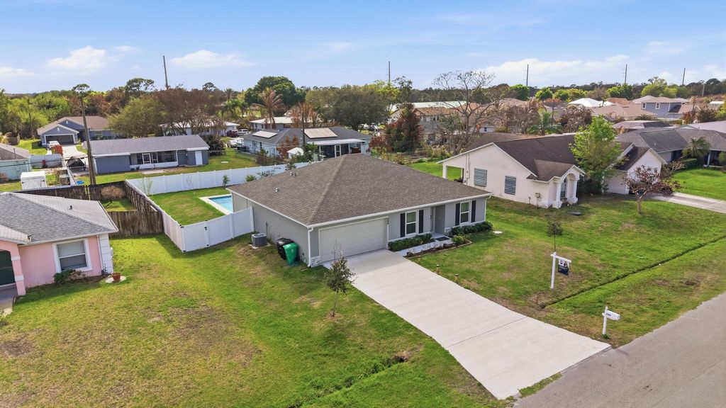 Photo of 684 SE Crescent Avenue, Port Saint Lucie, FL 34984 (MLS # R11158053)