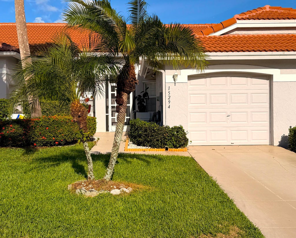 Photo of 15294 W TRANQUILITY LAKE Drive, Delray Beach, FL 33446 (MLS # B26076471)