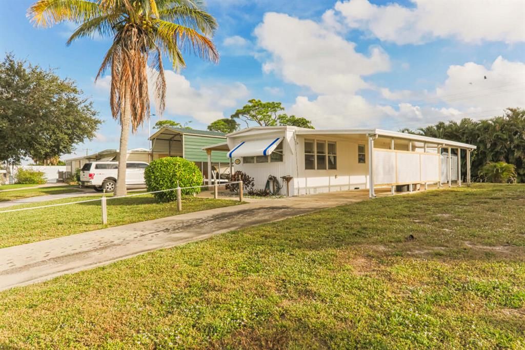 Photo of 7010 SE Ridgeway Terrace, Hobe Sound, FL 33455 (MLS # R10765897)