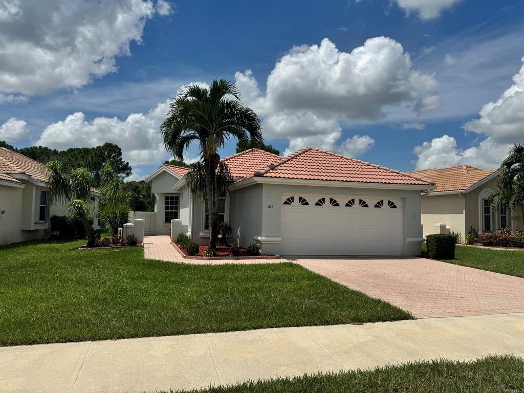 Photo of 511 SW Treasure Cove, Port Saint Lucie, FL 34986 (MLS # R11101798)