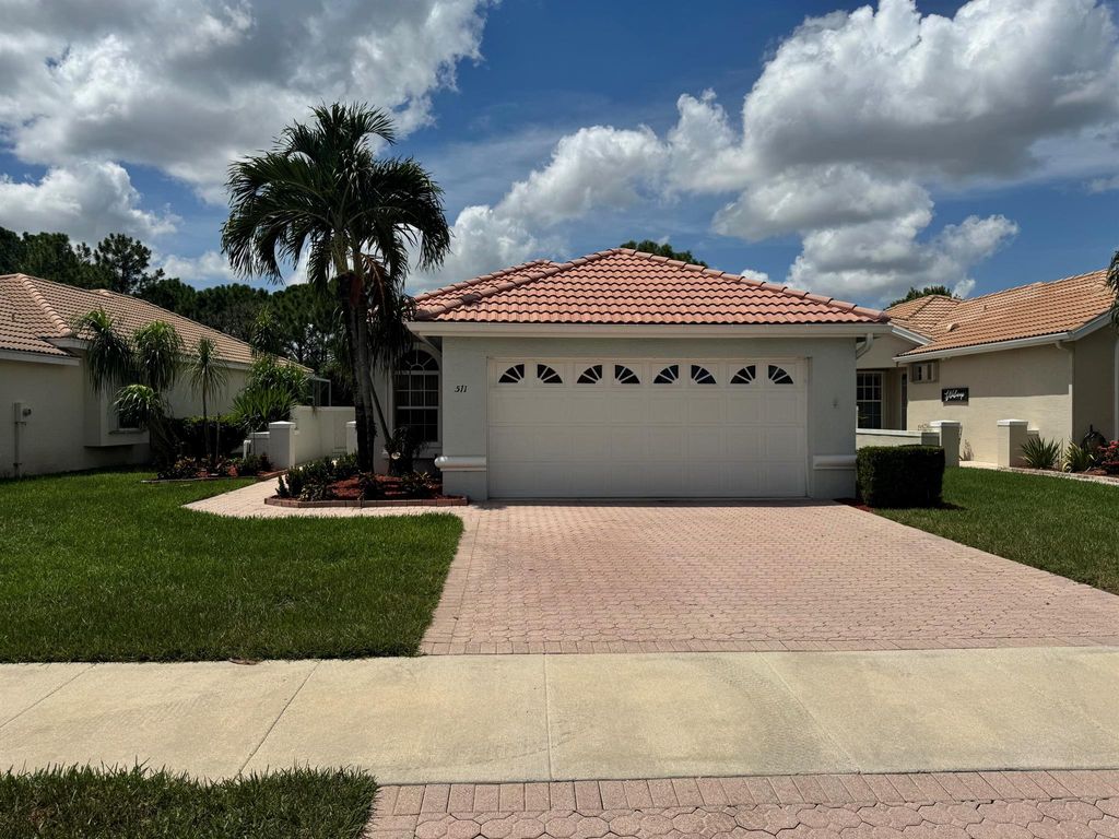Photo of 511 SW Treasure Cove, Port Saint Lucie, FL 34986 (MLS # R11101798)