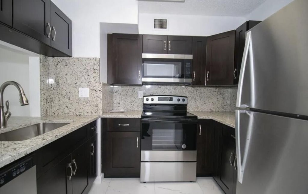 Photo of 11432 NW 45th Street, Coral Springs, FL 33065 (MLS # B26062252)