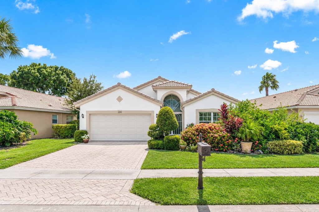 Photo of 12185 CASTLE PINES Road, Boynton Beach, FL 33437 (MLS # B26055351)