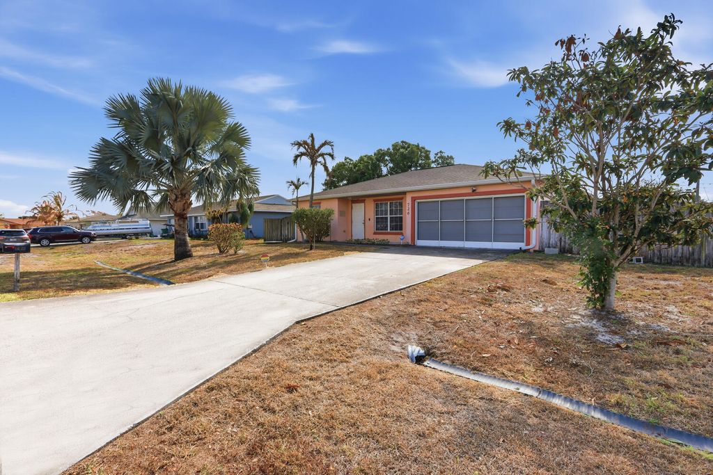 Photo of 726 SW Bond Road, Port Saint Lucie, FL 34953 (MLS # R11165394)