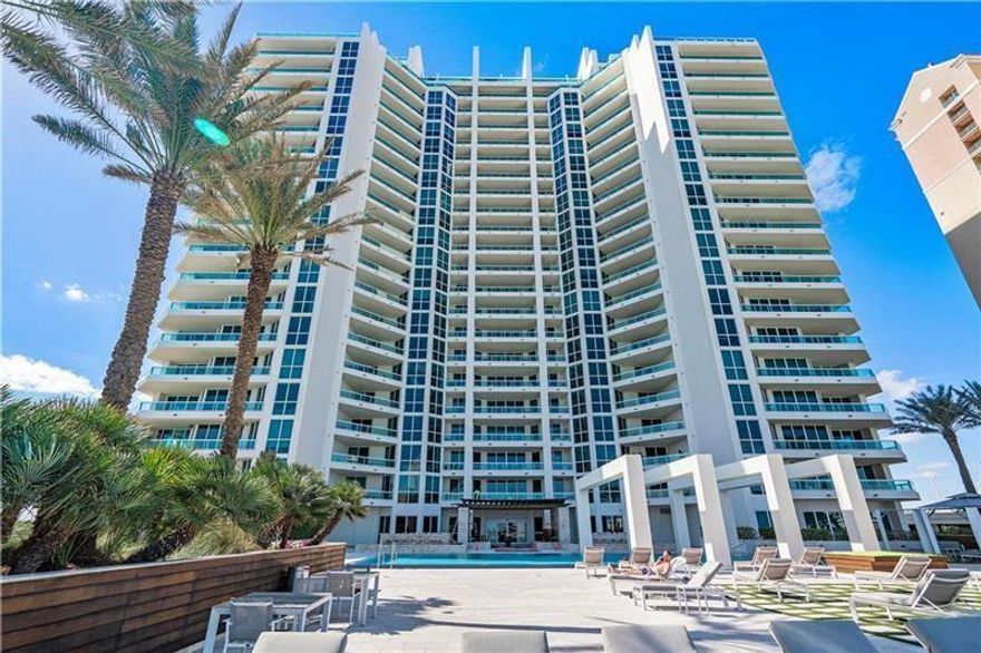 Experience breathtaking ocean views from this totally renovated flow-through residence located on the highest floor below the penthouse levels boasting higher ceilings than the floors below. This residence features 3 bedrooms, 3 baths, and a den. Upon entering directly into your private foyer from your elevator you witness panoramic views of the Atlantic Ocean. Every detail has been meticulously crafted including the spacious remodeled kitchen, renovated bathrooms, upgraded lighting, customized doors, and more. Wake up to sunrise views from your primary bedroom and enjoy sunsets and intracoastal views from the west. Enjoy luxurious living in your approximately 2400 sq. ft. of interior space. Immerse yourself in resort like amenities including front desk service, a dedicated concierge, complimentary valet, a fully equipped workout facility and more.