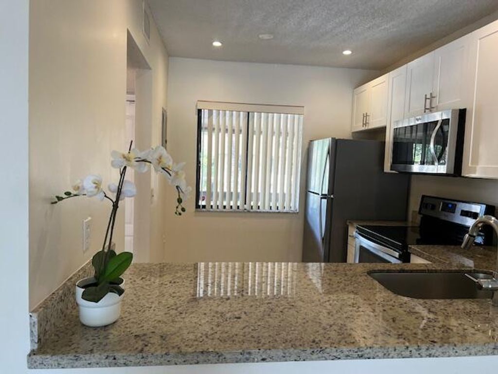 Photo of 6552 Arleigh Court #204, Boca Raton, FL 33433 (MLS # R10974635)