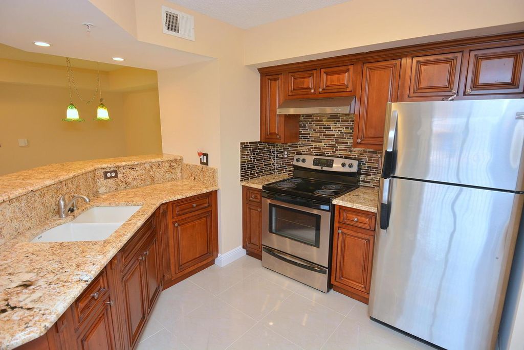 Photo of 3621 NW Adriatic Lane, Jensen Beach, FL 34957 (MLS # R10928401)