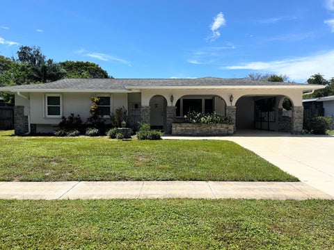 Photo of 330 NE SOLIDA Drive, Port Saint Lucie, FL 34983 (MLS # B26062038)