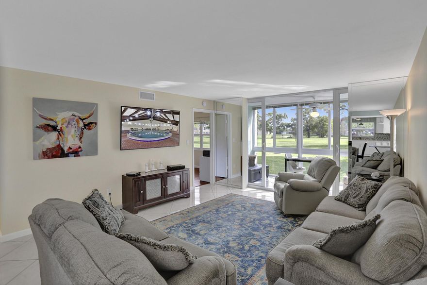 WOW! What a RARE FIND! 2/2 CORNER UNIT ON the 1st FLOOR in Sunrise Lakes. Welcome to this beautiful unit that features a 2020 modern kitchen, impact windows, tile throughout the unit and freshly painted in 2021. Enjoy breathtaking views from your enclosed patio where you can sit down and relax with your favorite cocktail with direct views of the golf course. Sunrise Lakes is a very active 55+ community that offers a great amenities. You are able to enjoy the main clubhouse which is equipped with a gym, racquetball court, an indoor pool, billiard room, theater, outdoor pool with BBQ stations and more.  There are 5 satellite pools, tennis courts, pickle ball, shuffleboard and GOLF IS INCLUDED IN YOUR HOA FEES! Schedule your showing today!