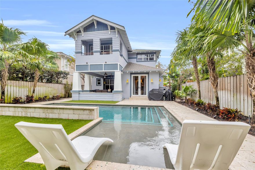 Experience the pinnacle of luxury living in the heart of Rio Vista, Ft. Lauderdale's Premier Enclave. This exquisite Craftsman home, built in 2013, is a masterpiece bathed in natural light, showcasing meticulous attention to detail. Sitting on a very quiet street deep in Rio Vista on a 7500 sft lot. 
The heart of the home, the fabulous chef's kitchen, is a culinary delight with soapstone countertops, high-end Miel & Wolf appliances, convenient island bar and concrete flooring.  
Indulge in the sumptuous master suite, a true haven of relaxation, featuring a fireplace and a balcony overlooking the pool area. Each additional bedroom is generously appointed, ensuring privacy and luxury for all. A large rec. room on the second floor adds for flexibility to be an extra bedroom or gym.