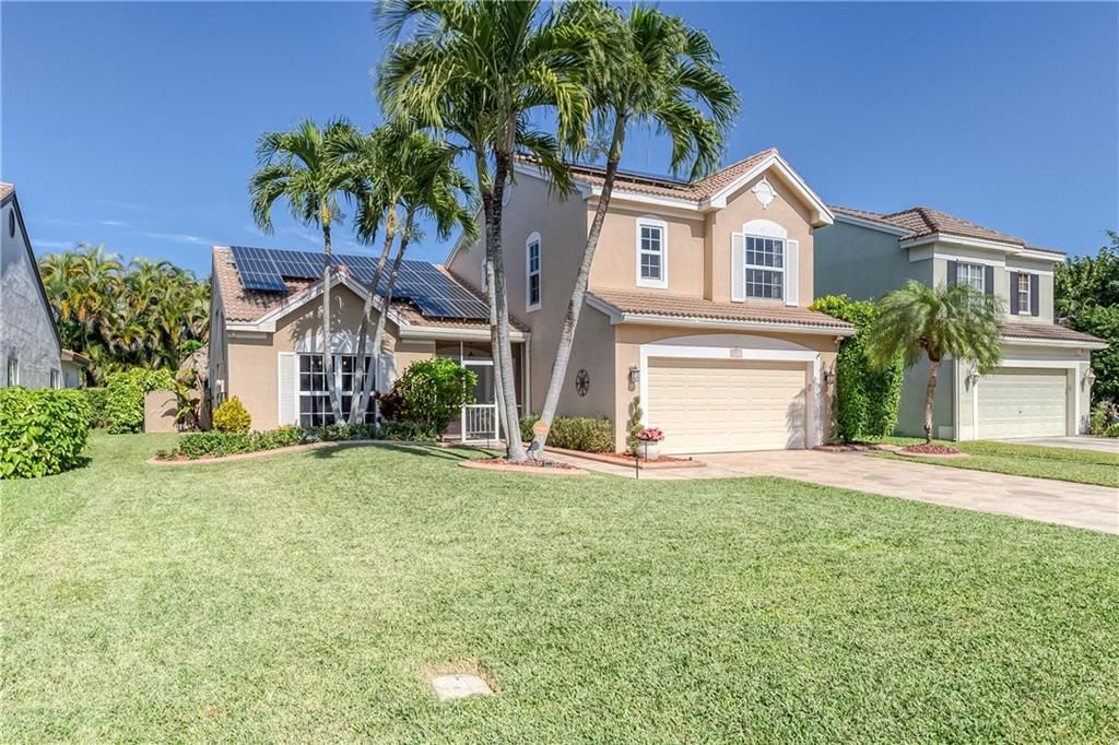 Photo of 3311 NW 71st St, Coconut Creek, FL 33073 (MLS # F10311038)