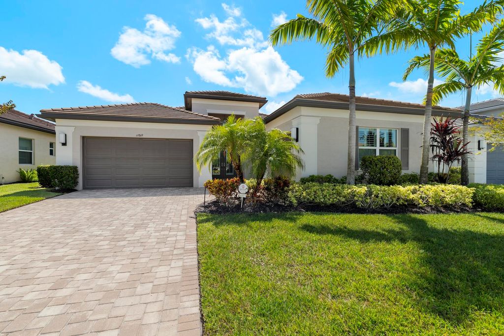 Photo of 11869 SW Marigold Lakes Drive, Port Saint Lucie, FL 34987 (MLS # R11105611)