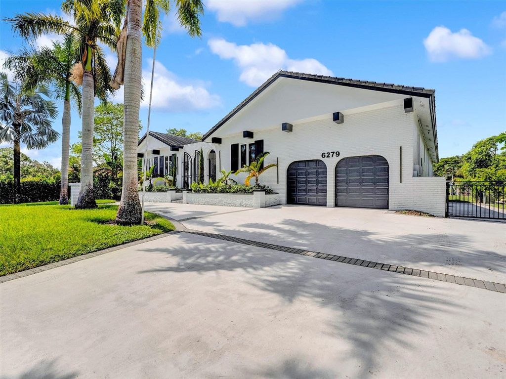 Photo of 6279 NW 74th Terrace, Parkland, FL 33067 (MLS # F10416751)