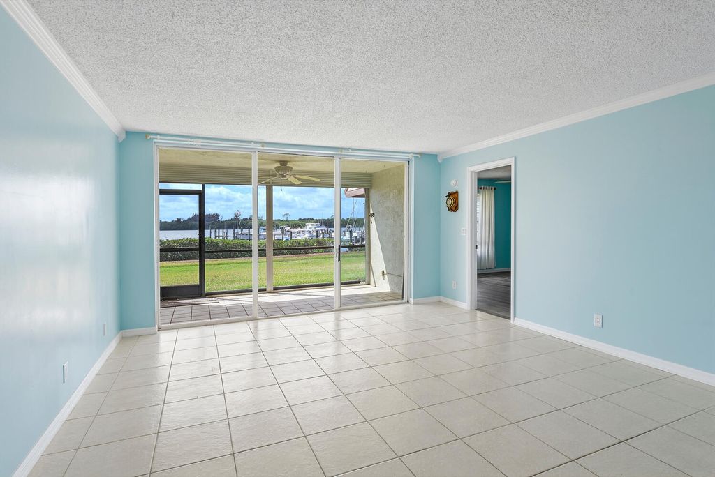 Photo of 3100 SE Pruitt Road #H-104, Port Saint Lucie, FL 34952 (MLS # R11168181)