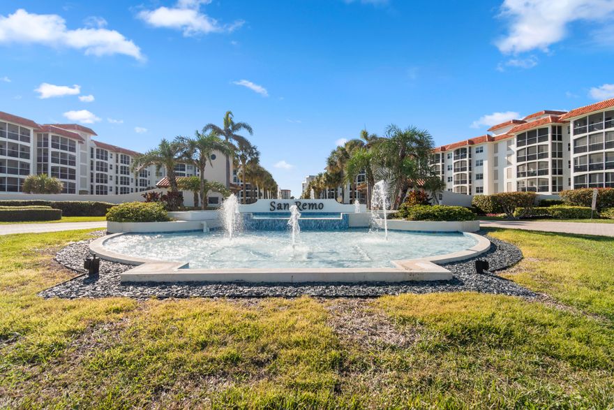 Wake up just steps from the Atlantic in this exquisite 2-bedroom, 2-bathroom residence in the highly desirable San Remo community. Located on A1A and uniquely positioned between the Atlantic Ocean and the Intracoastal Waterway. First floor unit features a large private patio, perfect for relaxing or entertaining in a tranquil tropical setting. The designer kitchen features quartz countertops, stainless steel range hood, and a large breakfast bar ideal for casual dining and larger gatherings. Master suite includes bonus expansion room.  The spacious primary suite offers direct access to the private patio, providing a peaceful retreat for relaxing outdoors. Both generously sized bedrooms include walk-in closets, while the beautifully updated bathrooms reflect a clean, contemporary design. The residence is truly turnkey and move-in ready. Enjoy an exclusive guard-gated waterfront lifestyle with 450 feet of private beach access, a marina with boat slips, a renovated clubhouse, resort-style pool and spa, fitness center, and  leisure amenities. Perfectly positioned beside Spanish River Park and just minutes from Downtown Boca Raton and Delray Beach, the community offers effortless access to world-class golf, fine dining, luxury shopping, activities, and premier coastal attractions.