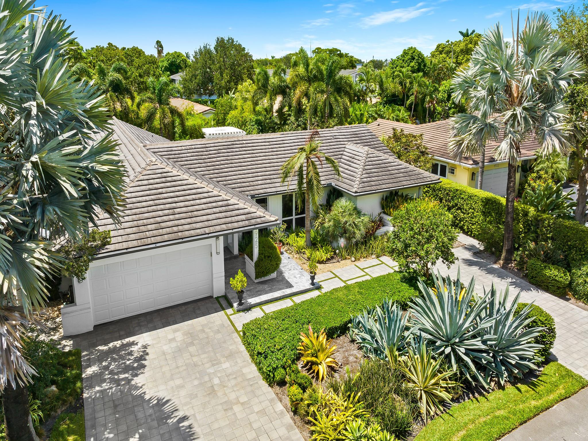Exclusive Coral Ridge Country Club!! Stunningly renovated modern 4BR +bonus rm/4BA/2CG pool home perfectly situated on a massive 12,500 SF ultra private lot. FAB Chef’s kitchen has top-of-the-line appliances including Sub-Zero, 2 huge islands/gas cooktop. Custom entertaining center w/wine cooler resides in the family room. 32' of retractable impact doors open to the expansive resort-style pool/hot tub/Pergola entertaining yard. Exquisite master suite w/'Dream Spa Bath' features Carrera marble, 4-pt jet shower, thermal air hydro soaking tub & huge WIC. New wide-planked wood flooring in foyer & secondary bedrooms; New laundry room w/overflow refrigerator; surround sound thru-out home. Immaculate garage w/custom cabinetry, new flooring & mini-split AC. ALL impact windows and doors, 2017 Roof.
