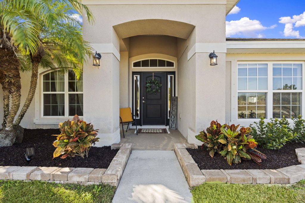 Photo of 2066 SW Quarry Street, Port Saint Lucie, FL 34953 (MLS # R11159205)