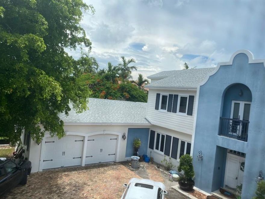 BOATERS PARADISE with over 100ft dock space. No fixed bridges easy access to ocean. 8 beds 6 baths with Pool in a Highly exclusive neighborhood in South Florida Harborage Island.