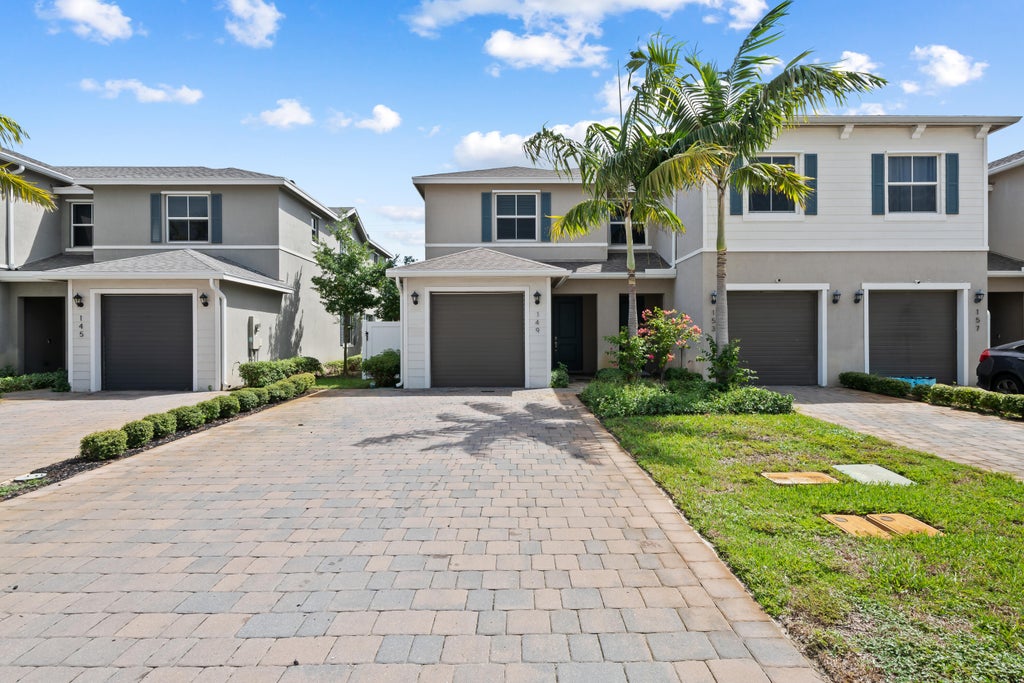 Photo of 149 Bandol Street, Riviera Beach, FL 33404 (MLS # B26073903)