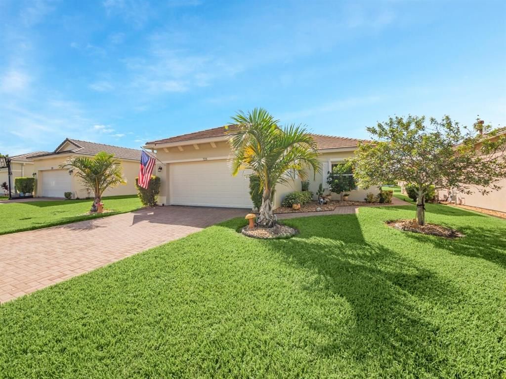 Photo of 725 SW Rocky Bayou Terrace, Saint Lucie West, FL 34986 (MLS # R10753550)