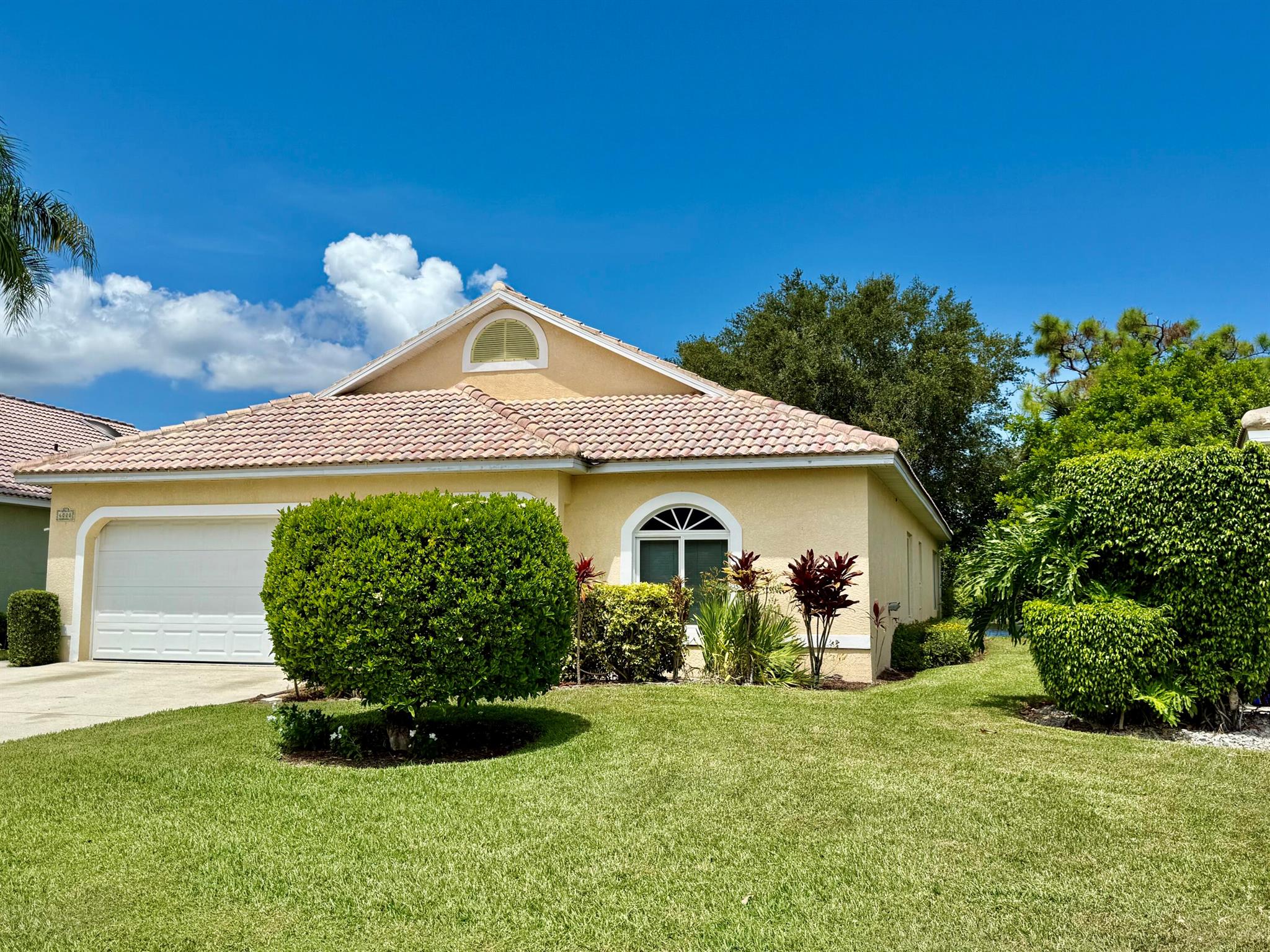 Partially furnished, spacious lakefront home in the gated community of Emerald Lakes. All new kitchen appliances. The proximity to almost everything in Martin County is so convenient as well as to Palm Beach County. This is a community for ALL ages that offers sidewalks, streetlights, a community pool/clubhouse, and pickleball. This 3/2/2 CBS home with a 2-car garage has impact windows throughout. The layout of the interior has 3 bedrooms with the master on one side with 2 closets, one being larger, and a bathroom with a separate shower and tub. The entire back porch was enclosed with impact windows and A/C and offers great lake views. The home lives very spaciously. Come and see.