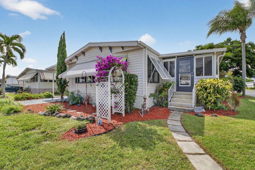 OPEN CONCEPT living in this unit with CUSTOM cabinets and QUARTZ countertops! NEWER Samsung appliances in the kitchen!  Bathroom is handicap accessible with a roll in shower and new floors and vanity! BRAND NEW washer/dryer inside. Large Florida room is an extra living space that is not included in the square footage (with A/C!) Corner lot with attractive landscaping and a side patio.  VAULTED ceilings in living area! Low HOA at only $250 per month includes: internet, water, sewer, trash removal,  and 24 Hr manned gate. Jamaica Bay has 2 heated pools, a clubhouse, billiards, pickleball, golf chipping area, motorcycle and RV parking, on site maintenance and support staff. Pet friendly with 2 pets allowed up to 20 pounds each. CASH ONLY community with no rentals allow