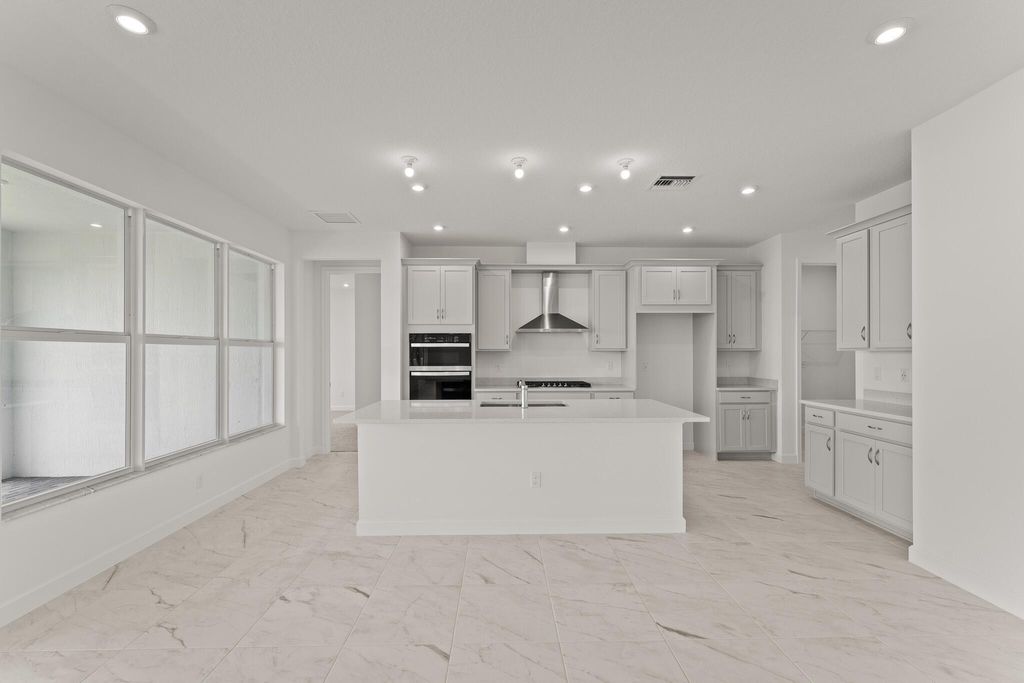 Photo of 13566 SW Bally Drive, Port Saint Lucie, FL 34987 (MLS # R11103025)