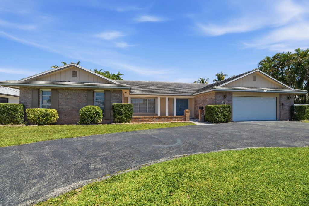 Photo of 232 Gleneagles Drive, Lake Worth, FL 33462 (MLS # B26022782)
