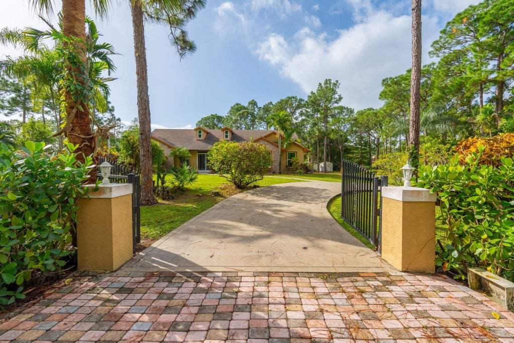 Photo of 16824 79th Court N, Loxahatchee, FL 33470 (MLS # B26093339)