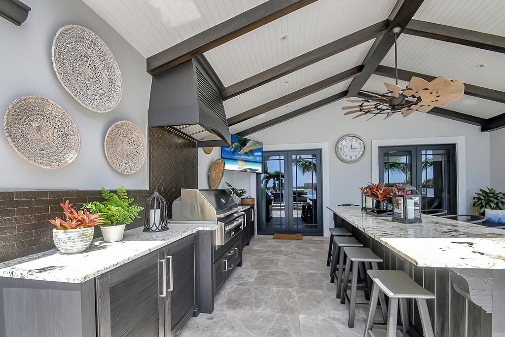 Photo of 1 Duke Drive, Lake Worth Beach, FL 33460 (MLS # B26026733)