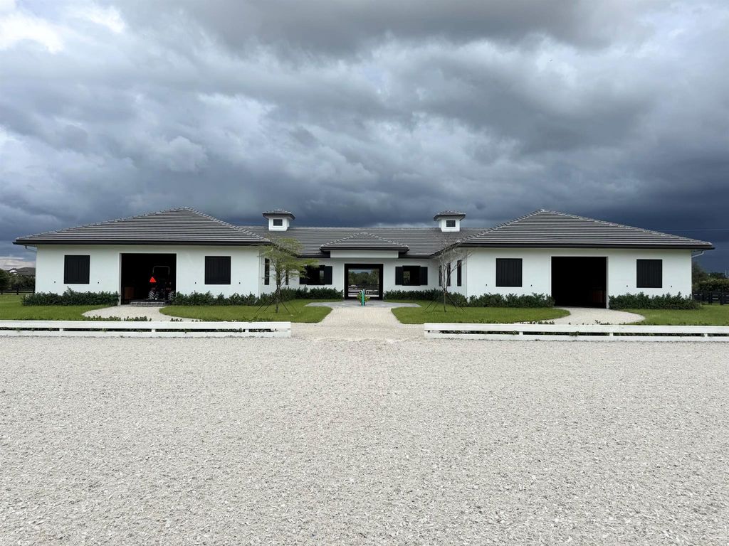 Photo of 19550 Egret Lane, Loxahatchee, FL 33470 (MLS # R11132012)