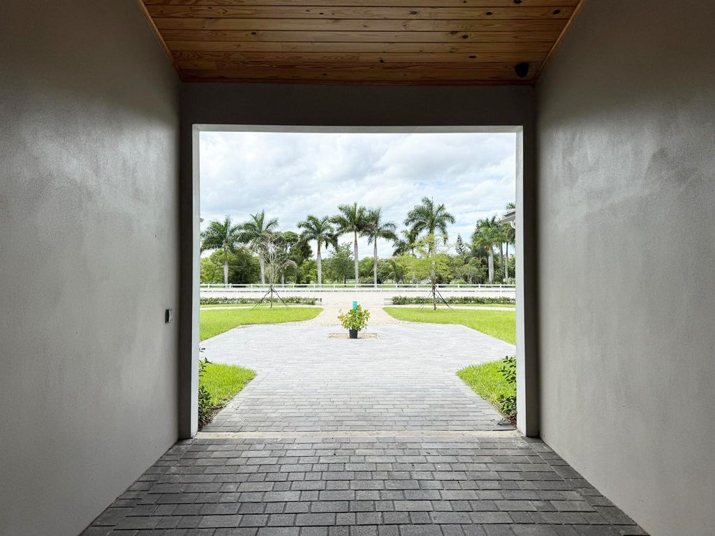 Photo of 19550 Egret Lane, Loxahatchee, FL 33470 (MLS # R11132012)