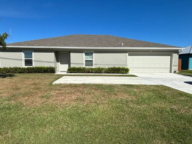 This beautifully updated 4-bedroom home with a den boasts new tile flooring, an extra concrete pad for convenient access and parking, and a fenced yard perfect for family relaxation and play. Ideally located near schools, beaches, Stuart, Jensen Beach, shops, restaurants, and local activities, with easy I95 and Turnpike access. Plus, enjoy quick bites and shopping at US1 and the Treasure Coast Mall nearby!