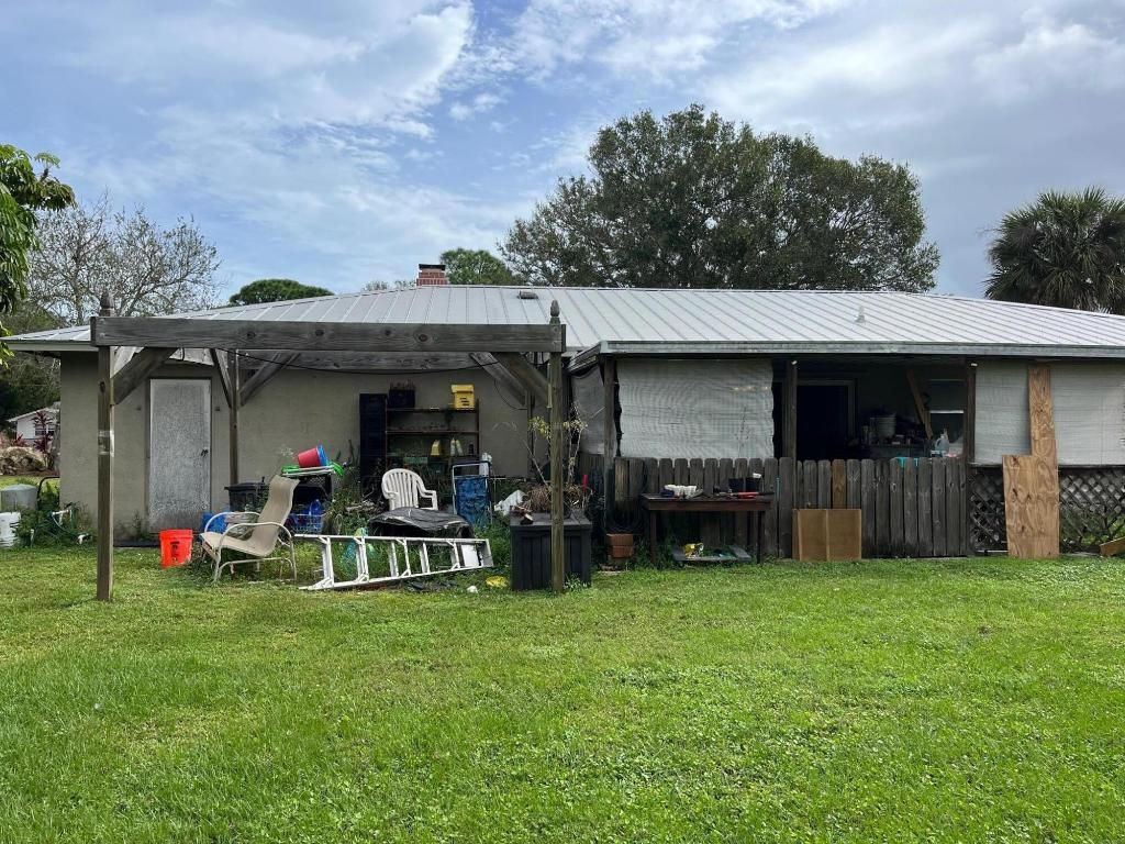 Photo of 4611 Pinetree Drive, Fort Pierce, FL 34982 (MLS # R10937199)