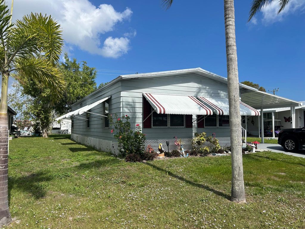 Photo of 63 Ipanema Way, Fort Pierce, FL 34951 (MLS # R11144995)