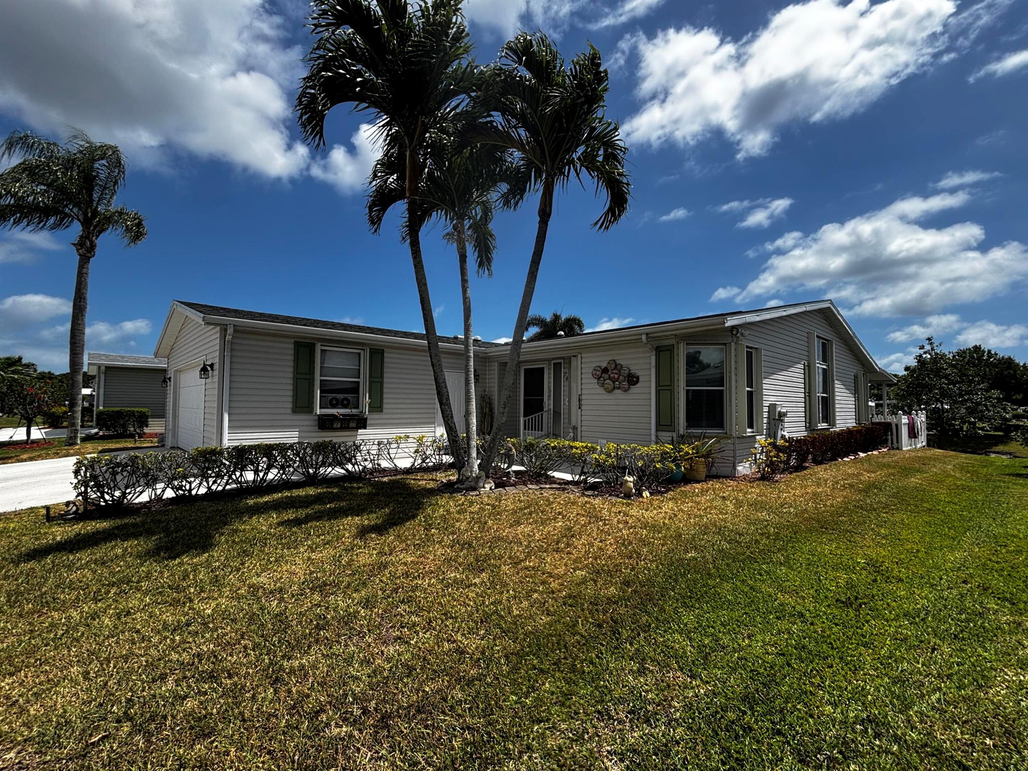 Looking for a three bedroom two bathroom home on the water. Here it is. Over 1800 SF under Air. 40' enclosed Lanai on the back of home over looking the water . Amazing open floor plan. great for entertaining .Upgraded appliance in the chef dream kitchen. Lots of storage. Two car garage. Oversized rooms. formal dining room . High velocity impact shutters throughout. brand new roof and much moreLand Leased Property. 55 and older active community. Lot's of ammenities. 18 hole Golf Course. Open to public. Pickellball, Tennis Three Clubhouses with pools. Horseshoes, shuffleboard Excerise rooms and much more. RV AND BOAT STOARAGE ON SITEFINANCING AVAILABLE IF NEEDED