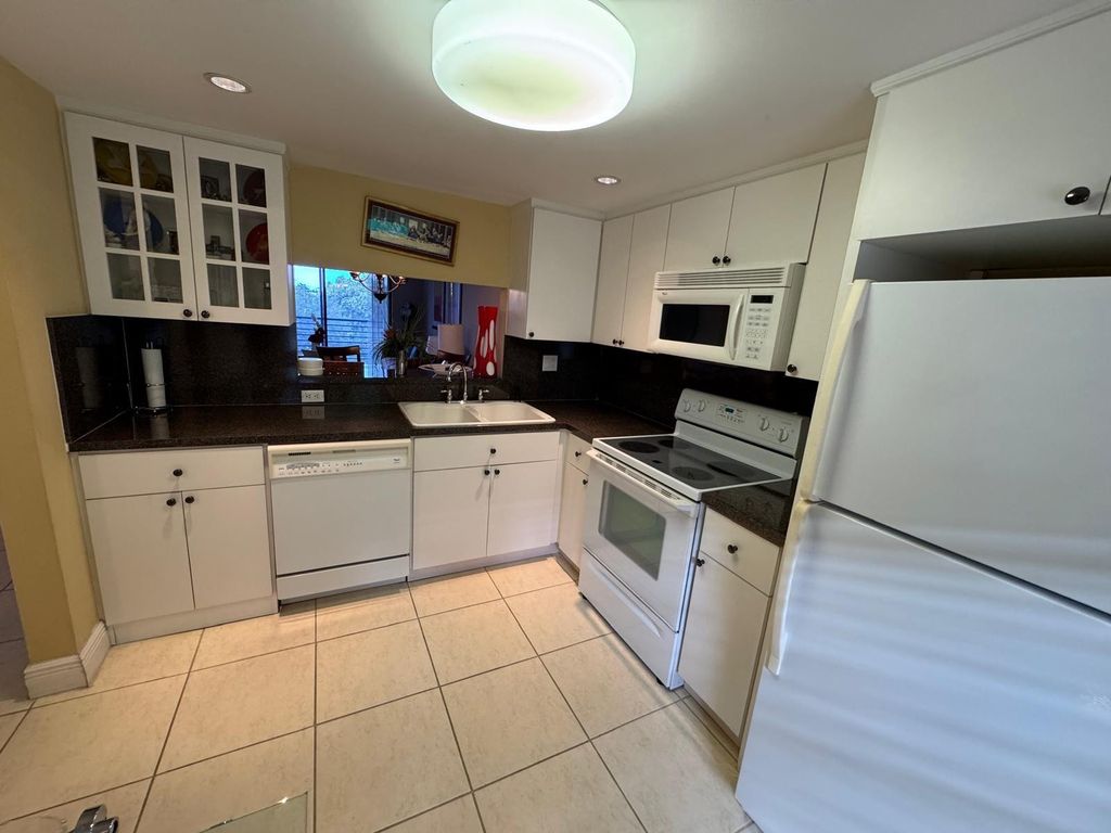Photo of 900 Colony Point Circle #407, Pembroke Pines, FL 33026 (MLS # F10542750)