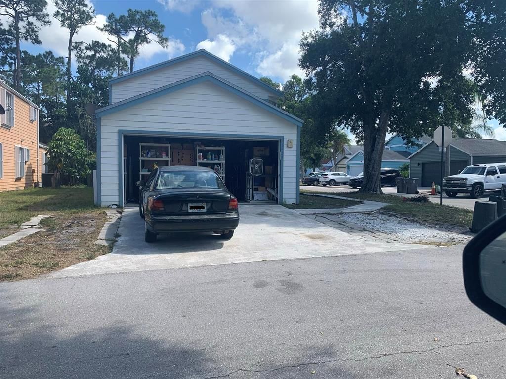 Photo of 5648 Rambler Rose Way, West Palm Beach, FL 33415 (MLS # R10720983)