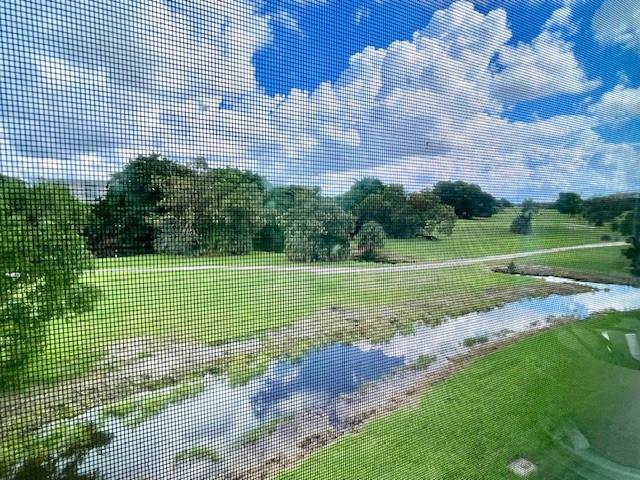 Water views from every window are rare and a treat for people who enjoy a peaceful view. Brand new A/C installed this spring, the water heater is from 2023. 100% hurricane protection with impact glass along the back and accordion shutters along the catwalk. Steps from the pool with extra facilities, plus easy access to walking paths and a short stroll to the nearby community center, Publix and park with pickleball courts, etc. Some furniture can stay.