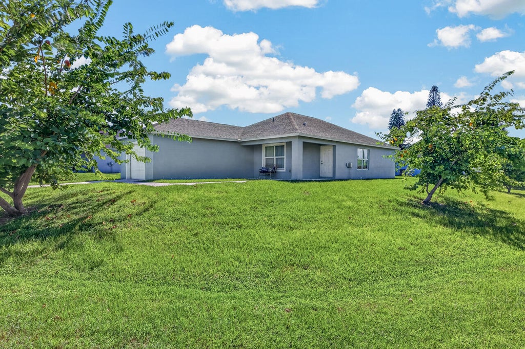 Photo of 1974 SE GENA Road, Port Saint Lucie, FL 34952 (MLS # B26074841)